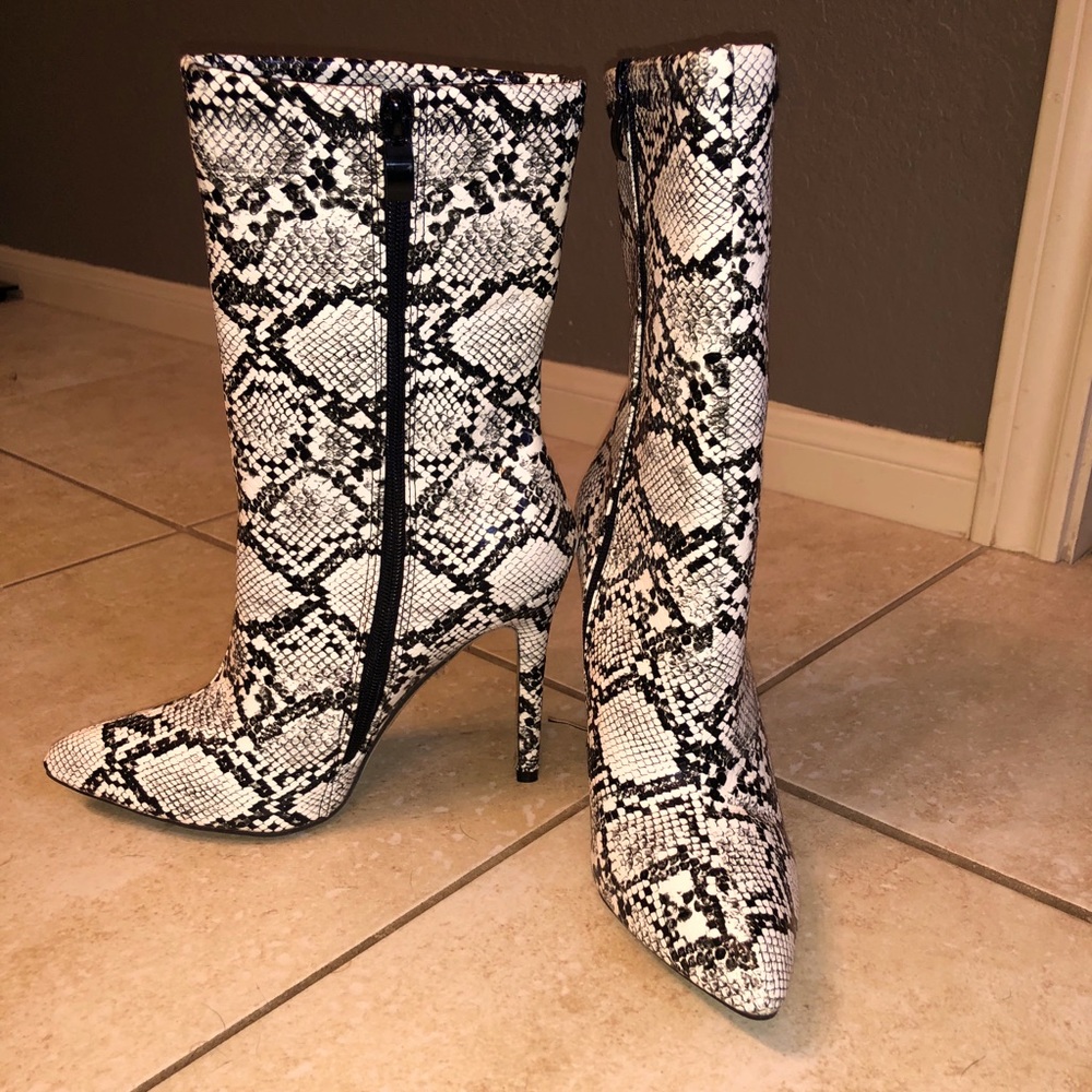 Calf high snakeskin boots